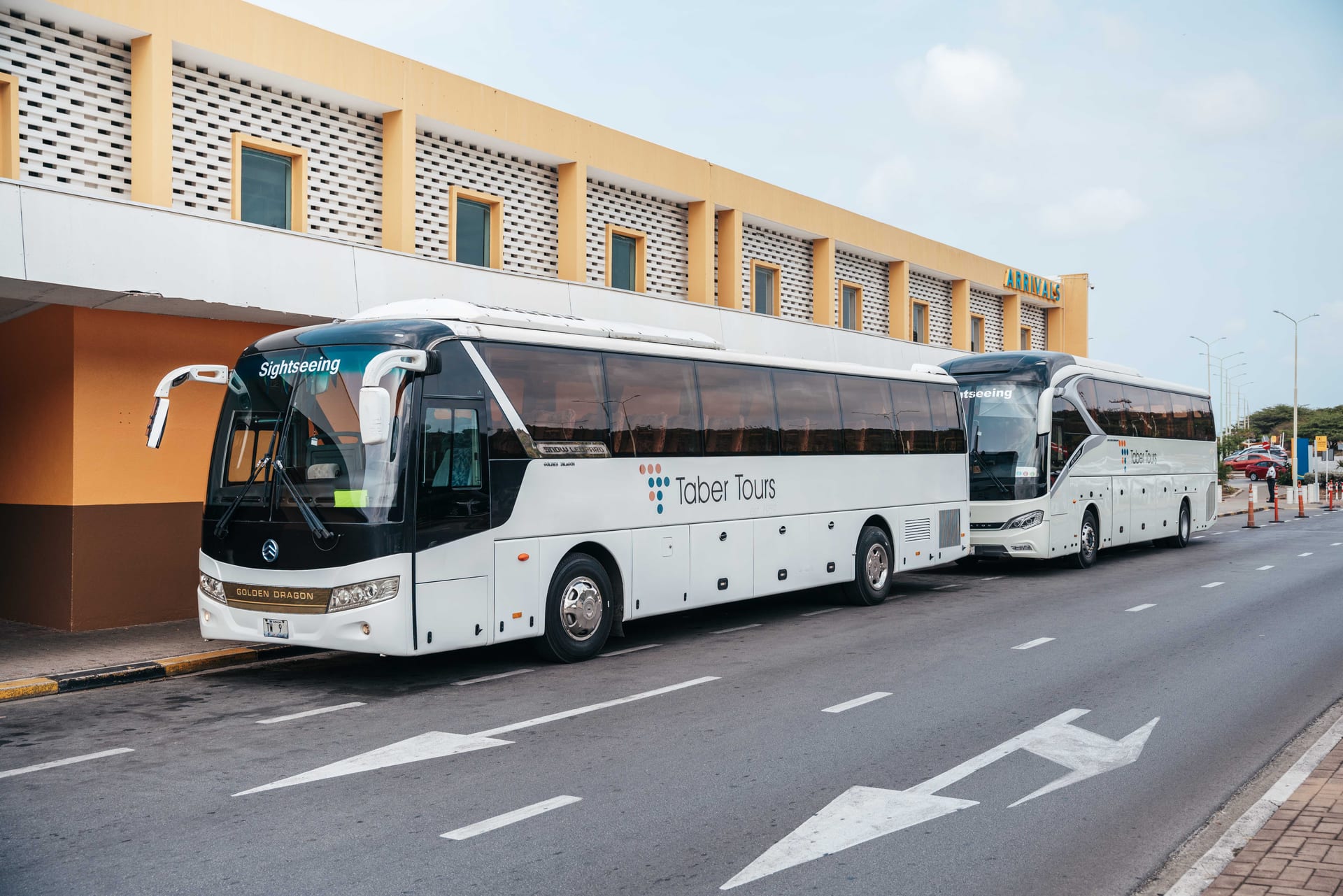 Two FBTT Taber Tours coaches parked at the Seru di Mahuma depot in Curaçao